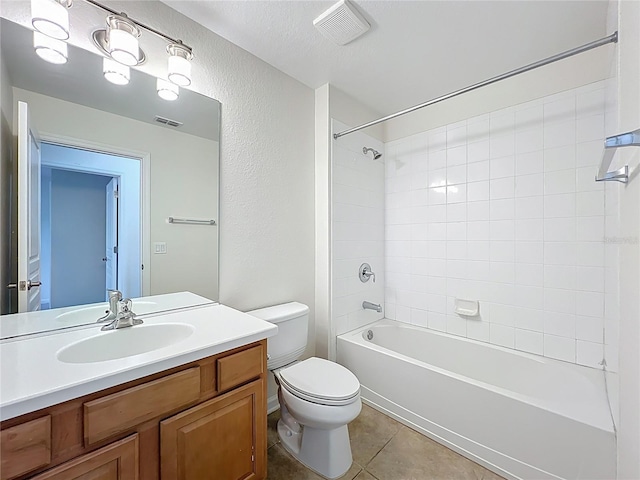 full bathroom with tile patterned flooring, visible vents, toilet, and vanity