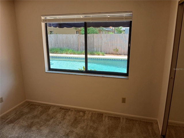 406 Red Coat Ln, Orlando, FL 32825 - carpeted empty room featuring baseboards