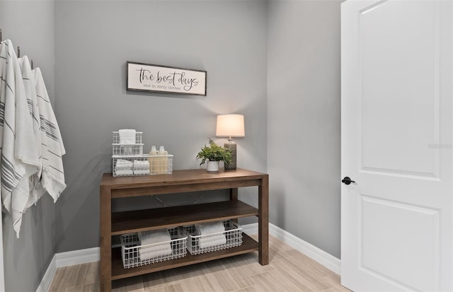 interior space featuring baseboards