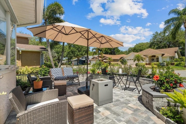 view of patio / terrace with an outdoor fire pit