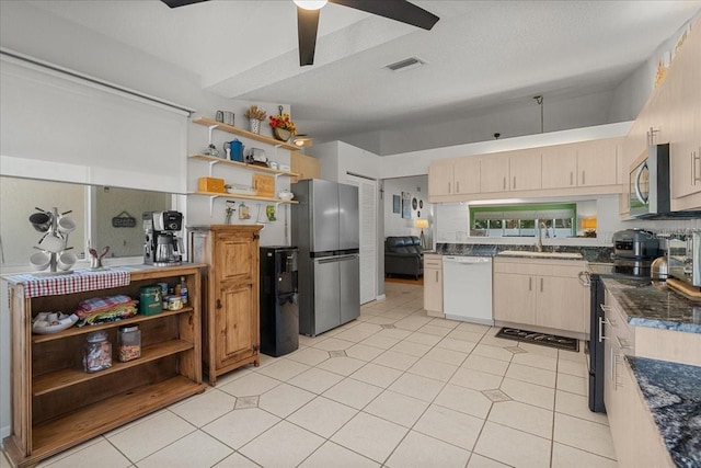 kitchen featuring a ceiling fan, open shelves, a sink, appliances with stainless steel finishes, and visible vents