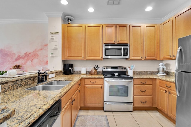 2840 Bella Vista Dr, Davenport, FL 33897 - kitchen featuring light stone countertops, stainless steel appliances, visible vents, and a sink