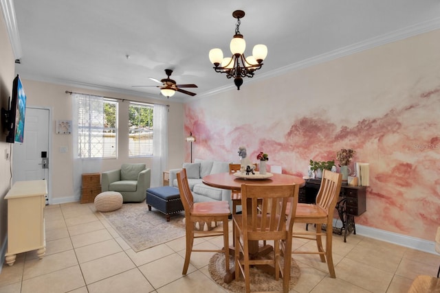 2840 Bella Vista Dr, Davenport, FL 33897 - dining area featuring ceiling fan with notable chandelier, crown molding, baseboards, and light tile patterned floors