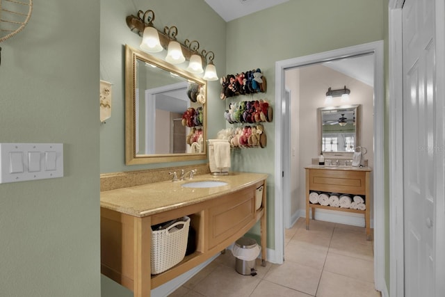 2840 Bella Vista Dr, Davenport, FL 33897 - bathroom with baseboards, vanity, and tile patterned floors