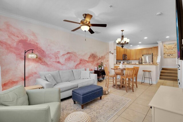 2840 Bella Vista Dr, Davenport, FL 33897 - living area featuring light tile patterned flooring, baseboards, recessed lighting, ceiling fan with notable chandelier, and ornamental molding