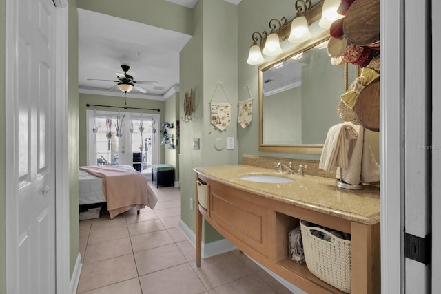 2840 Bella Vista Dr, Davenport, FL 33897 - bathroom with vanity, baseboards, tile patterned flooring, ensuite bath, and ornamental molding