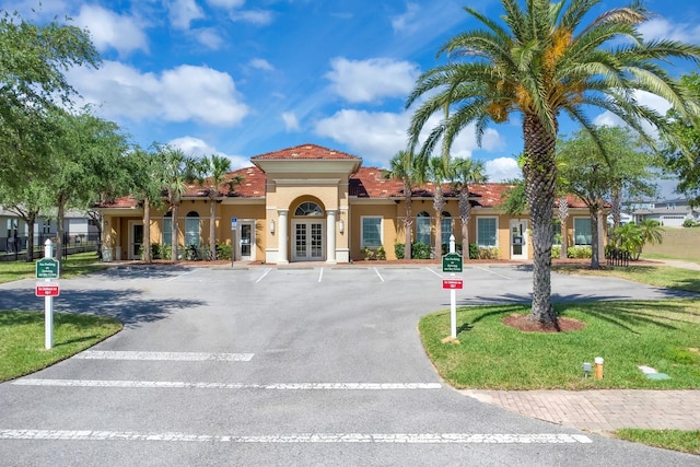 2840 Bella Vista Dr, Davenport, FL 33897 - view of building exterior featuring uncovered parking