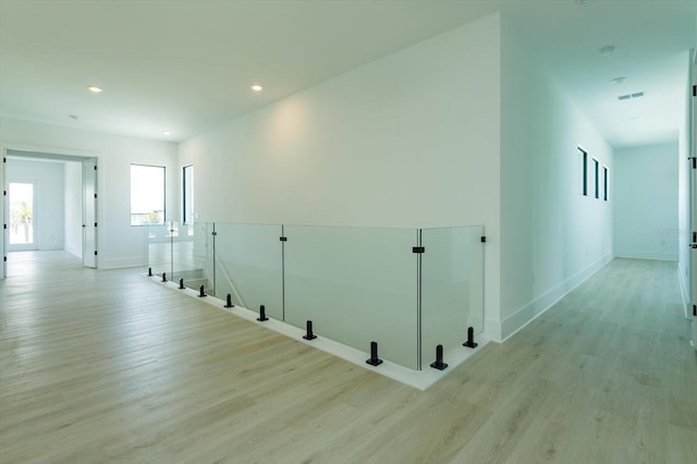 16825 Bolsena Dr, Montverde, FL 34756 - hallway with light wood finished floors and recessed lighting