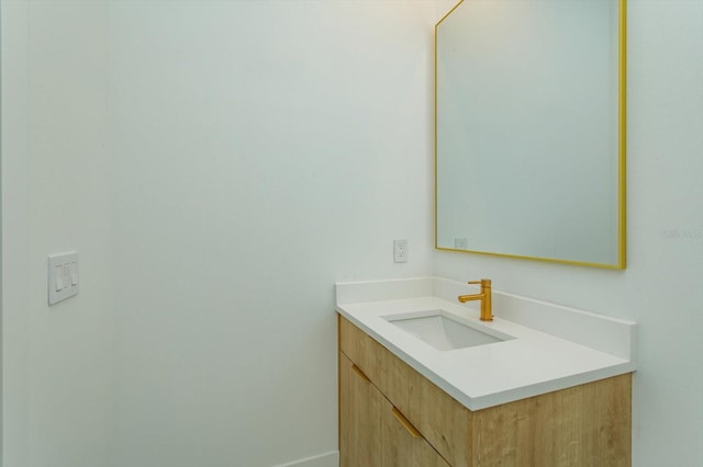 16825 Bolsena Dr, Montverde, FL 34756 - bathroom featuring vanity and baseboards