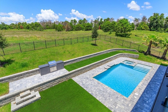 16825 Bolsena Dr, Montverde, FL 34756 - view of swimming pool with area for grilling, a patio, a fenced backyard, and a pool with connected hot tub