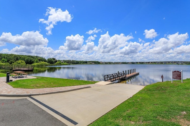 16825 Bolsena Dr, Montverde, FL 34756 - dock with a water view and a yard