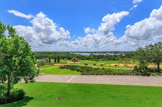 16825 Bolsena Dr, Montverde, FL 34756 - view of home's community featuring a water view and a lawn