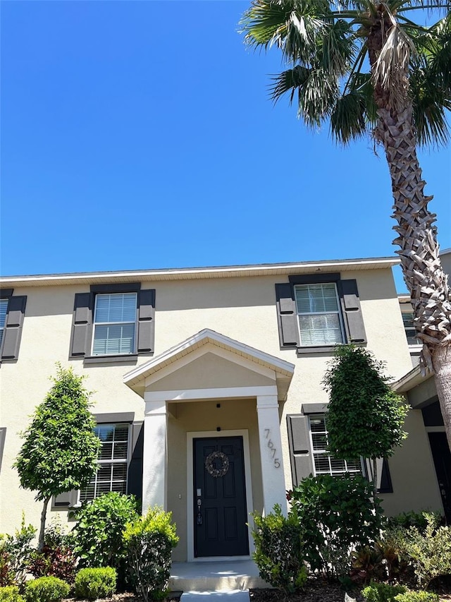 view of front facade featuring stucco siding