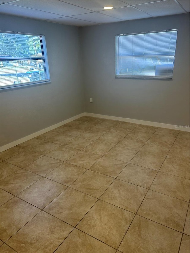 empty room with baseboards