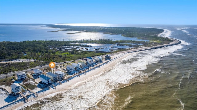 aerial view with a beach view and a water view