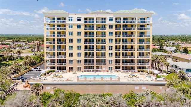 4071 S Atlantic Ave Unit 803, New Smyrna Beach, FL 32169 - view of apartment building / complex with a community pool