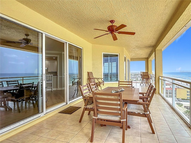 4071 S Atlantic Ave Unit 803, New Smyrna Beach, FL 32169 - balcony with ceiling fan and a water view