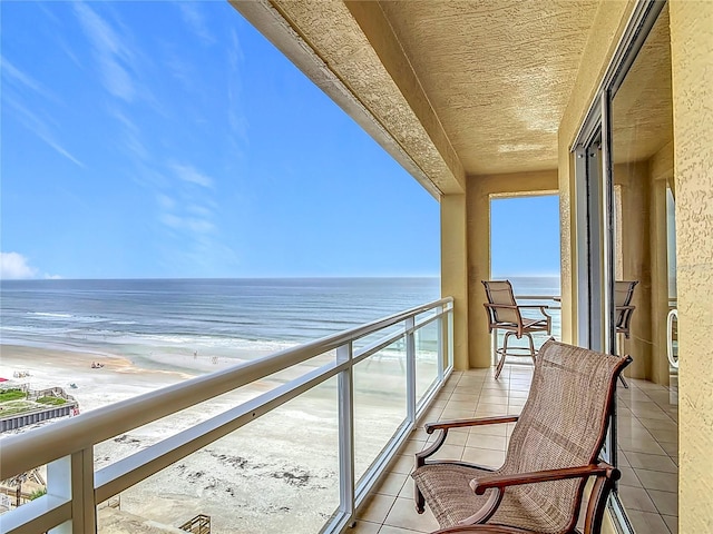 4071 S Atlantic Ave Unit 803, New Smyrna Beach, FL 32169 - balcony featuring view of water and beach