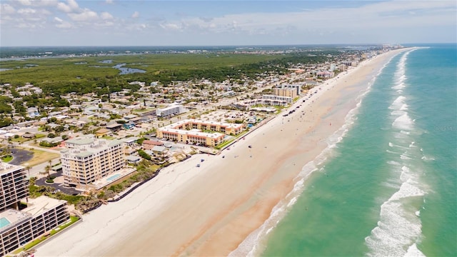 4071 S Atlantic Ave Unit 803, New Smyrna Beach, FL 32169 - drone / aerial view of waterfront with a beach