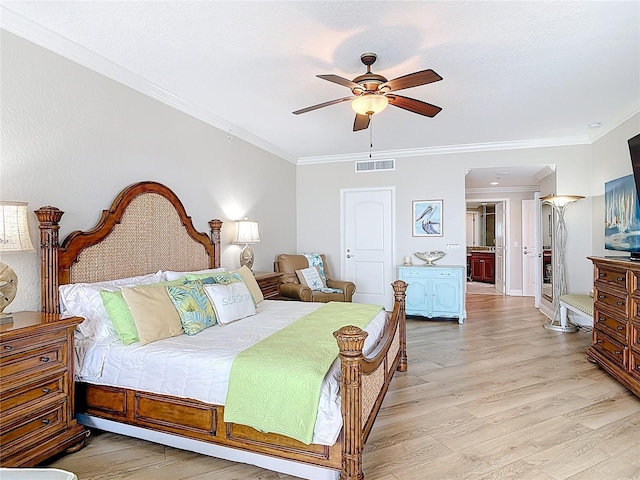 4071 S Atlantic Ave Unit 803, New Smyrna Beach, FL 32169 - bedroom with light wood-style floors, crown molding, a ceiling fan, and ensuite bath
