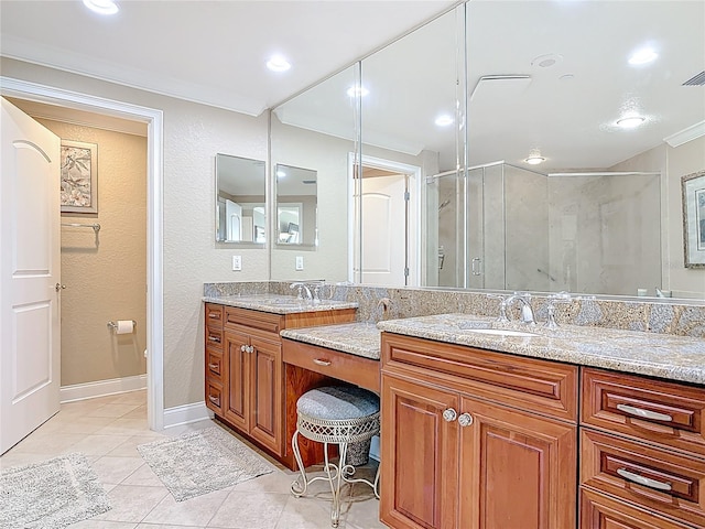 4071 S Atlantic Ave Unit 803, New Smyrna Beach, FL 32169 - bathroom with double vanity, a shower stall, and tile patterned flooring