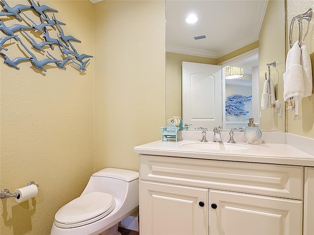 4071 S Atlantic Ave Unit 803, New Smyrna Beach, FL 32169 - half bath with vanity, toilet, and ornamental molding
