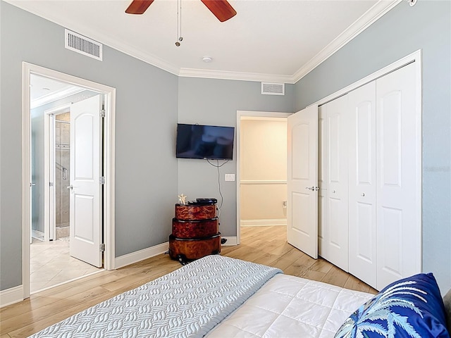 4071 S Atlantic Ave Unit 803, New Smyrna Beach, FL 32169 - bedroom with light wood-style floors, ornamental molding, a closet, baseboards, and a ceiling fan