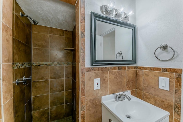 bathroom with vanity and a stall shower