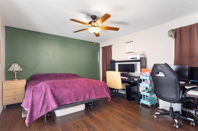 bedroom with a ceiling fan and wood finished floors