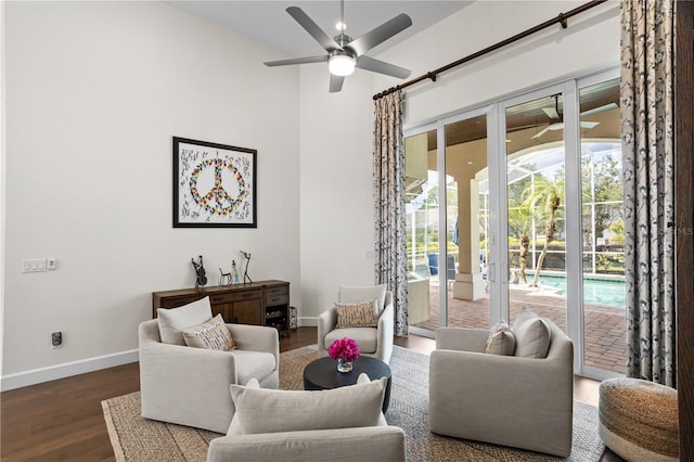 11401 Willow Stowe Ln, Windermere, FL 34786 - sitting room with ceiling fan, baseboards, and wood finished floors