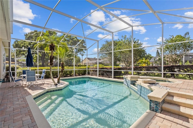 11401 Willow Stowe Ln, Windermere, FL 34786 - view of pool featuring a patio, a lanai, and a pool with connected hot tub