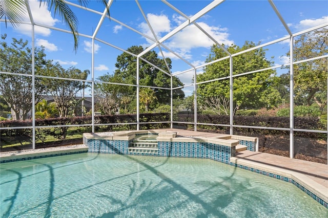 11401 Willow Stowe Ln, Windermere, FL 34786 - view of swimming pool with glass enclosure and a pool with connected hot tub