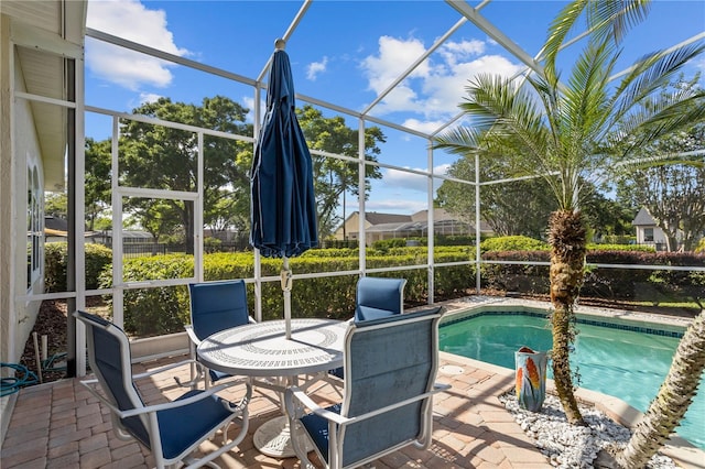 11401 Willow Stowe Ln, Windermere, FL 34786 - outdoor pool featuring a patio area and glass enclosure