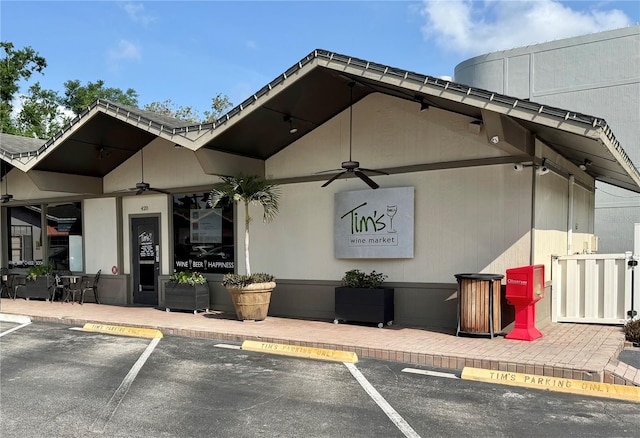 11401 Willow Stowe Ln, Windermere, FL 34786 - view of building exterior featuring uncovered parking