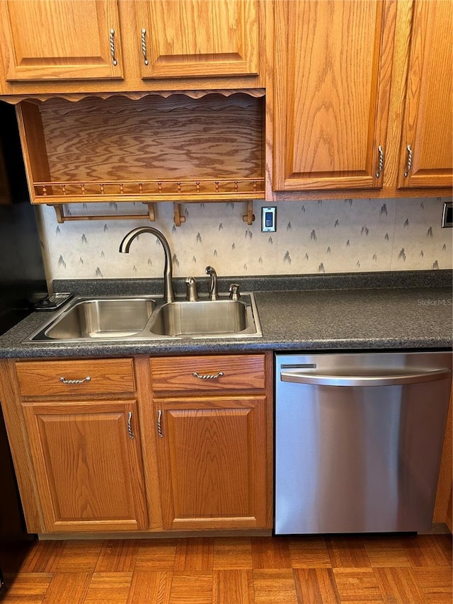 802 Park Lake Cir Unit 2, Maitland, FL 32751 - kitchen featuring dark countertops, dishwasher, a sink, and brown cabinetry