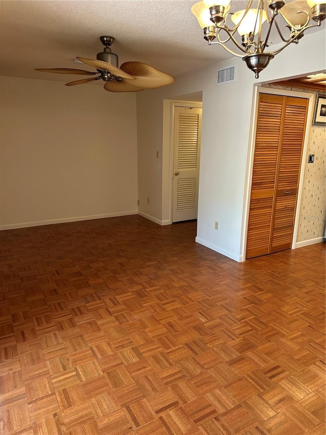802 Park Lake Cir Unit 2, Maitland, FL 32751 - empty room featuring baseboards, visible vents, and ceiling fan with notable chandelier