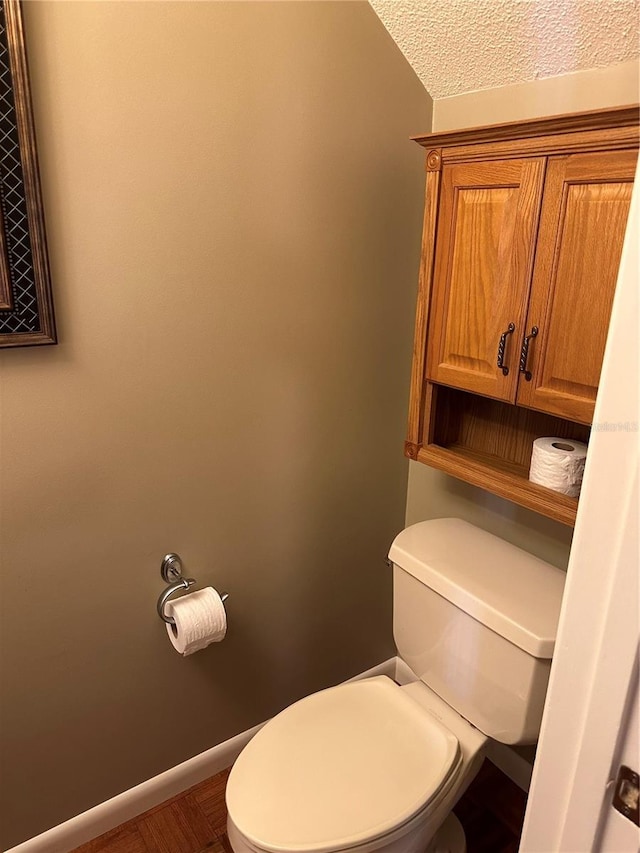 802 Park Lake Cir Unit 2, Maitland, FL 32751 - bathroom featuring baseboards and toilet