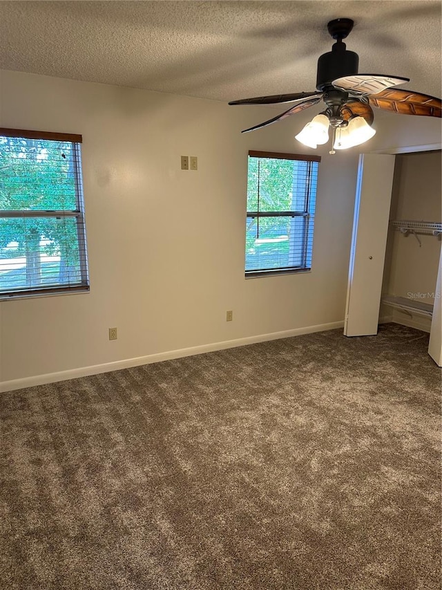 802 Park Lake Cir Unit 2, Maitland, FL 32751 - unfurnished bedroom with carpet, a textured ceiling, ceiling fan, and visible vents