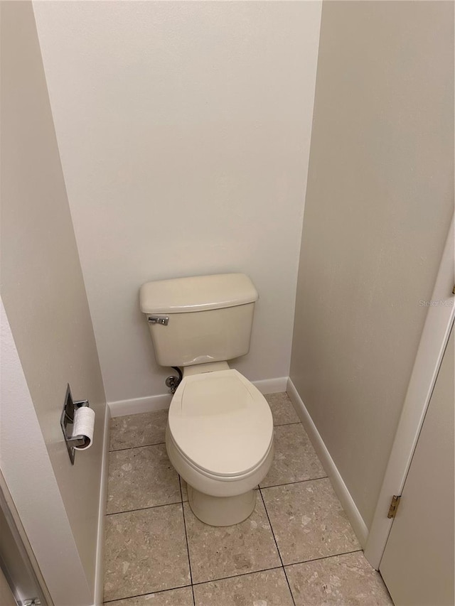 802 Park Lake Cir Unit 2, Maitland, FL 32751 - bathroom featuring toilet, tile patterned flooring, and baseboards
