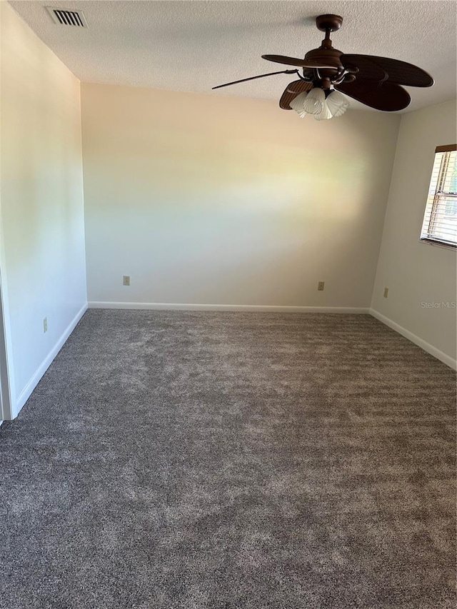 802 Park Lake Cir Unit 2, Maitland, FL 32751 - spare room with a ceiling fan, a textured ceiling, carpet, baseboards, and visible vents