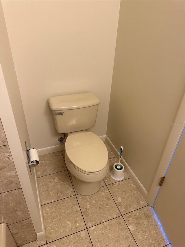802 Park Lake Cir Unit 2, Maitland, FL 32751 - bathroom featuring toilet, tile patterned flooring, and baseboards