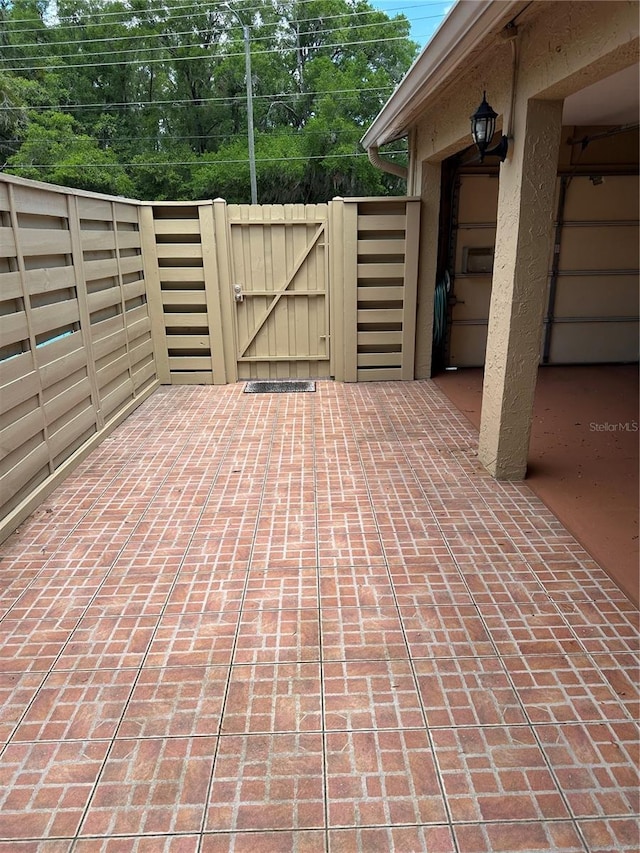 802 Park Lake Cir Unit 2, Maitland, FL 32751 - view of patio featuring fence and a gate