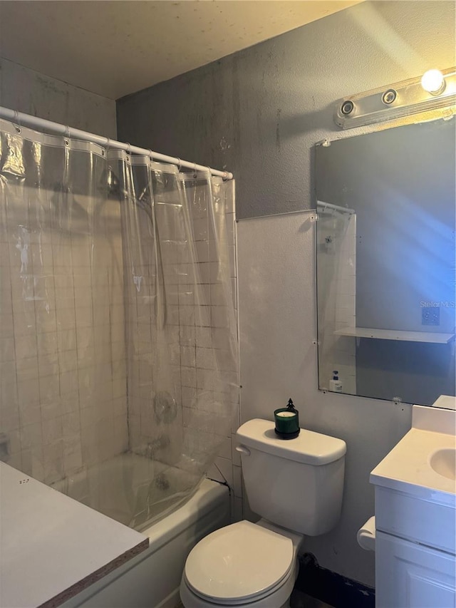 full bath featuring vanity, shower / bath combo, and toilet