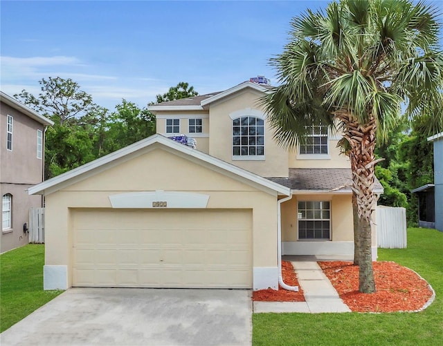 1822 Meadow Pond Way, Orlando, FL 32824 - traditional home with stucco siding, fence, a garage, a front lawn, and concrete driveway