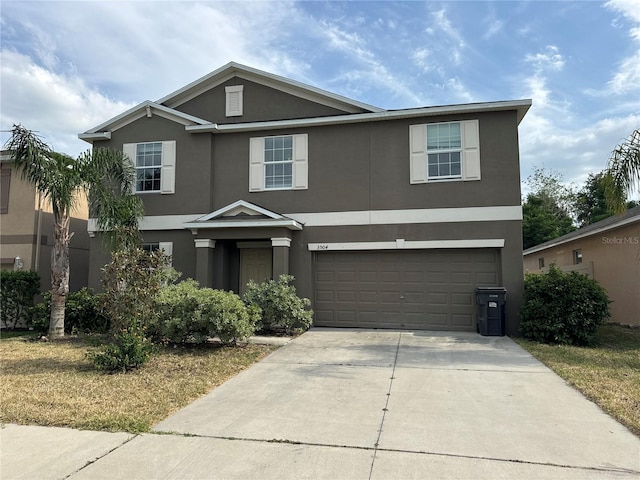 3504 Kearsney Abbey Cir, Dover, FL 33527 - view of front facade with a garage, stucco siding, and concrete driveway