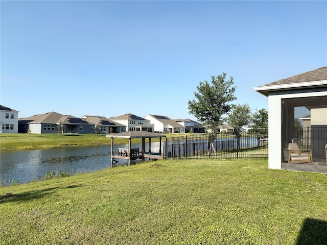 4905 Olivia Ct, Saint Cloud, FL 34772 - view of yard with fence, a water view, and a residential view