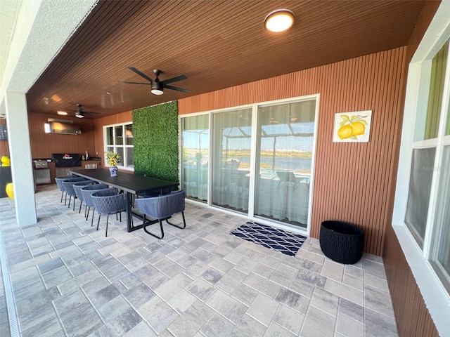 2926 Crest Wave Dr, Clermont, FL 34711 - view of patio with ceiling fan and a bar