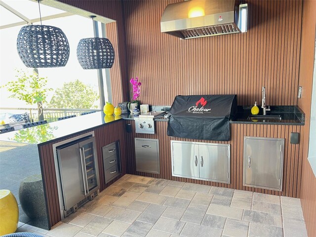 2926 Crest Wave Dr, Clermont, FL 34711 - view of patio / terrace with area for grilling, beverage cooler, and a sink