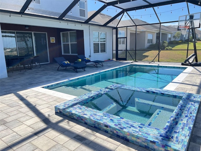 2926 Crest Wave Dr, Clermont, FL 34711 - view of swimming pool with glass enclosure, a pool with connected hot tub, and a patio area