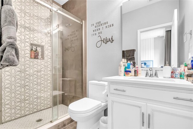 2926 Crest Wave Dr, Clermont, FL 34711 - full bathroom featuring toilet, vanity, and a stall shower